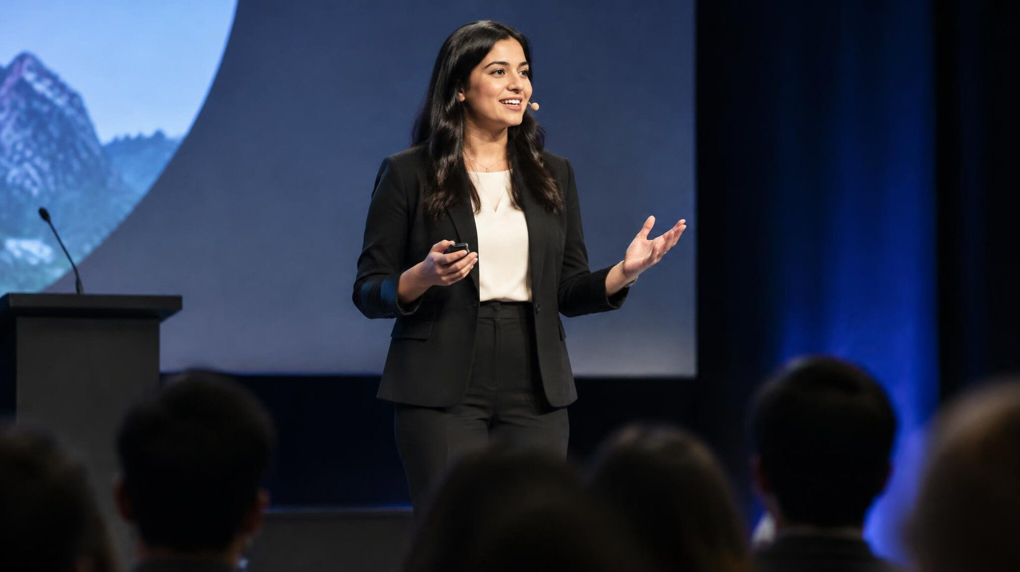 person speaking confidently on stage