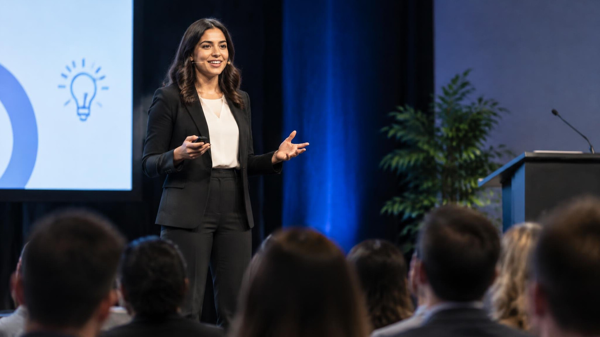 confident speaker on stage